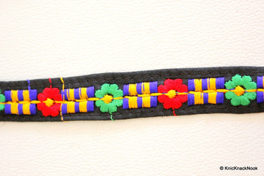 Black Fabric Trim With Green, Blue, Red And Orange Embroidery